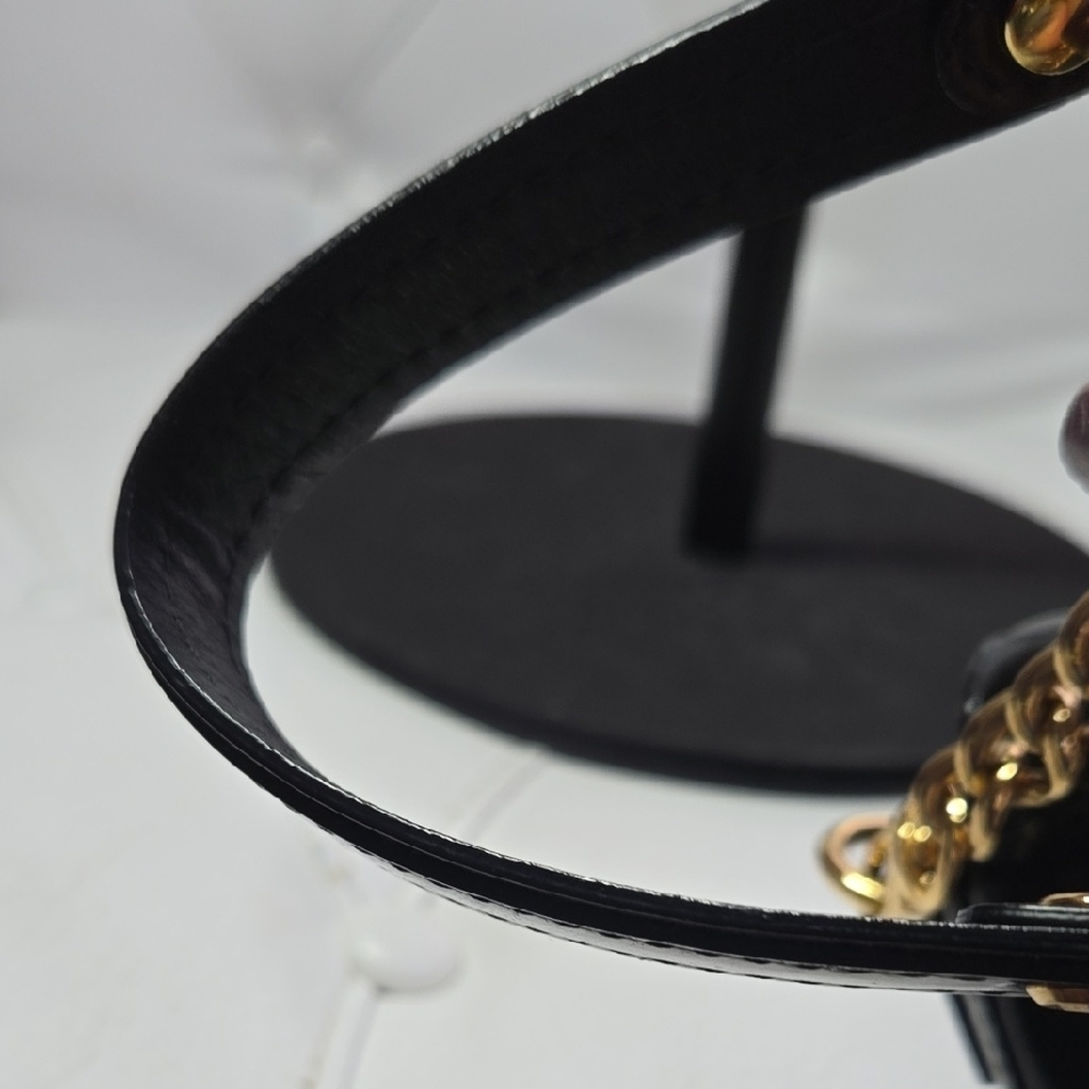 black MCM Mini crossbody bag with gold-plated hardware. - Picture 4 of 8